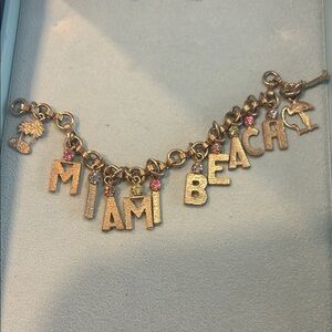 Gold Charm Bracelet with Pink and Green Accents